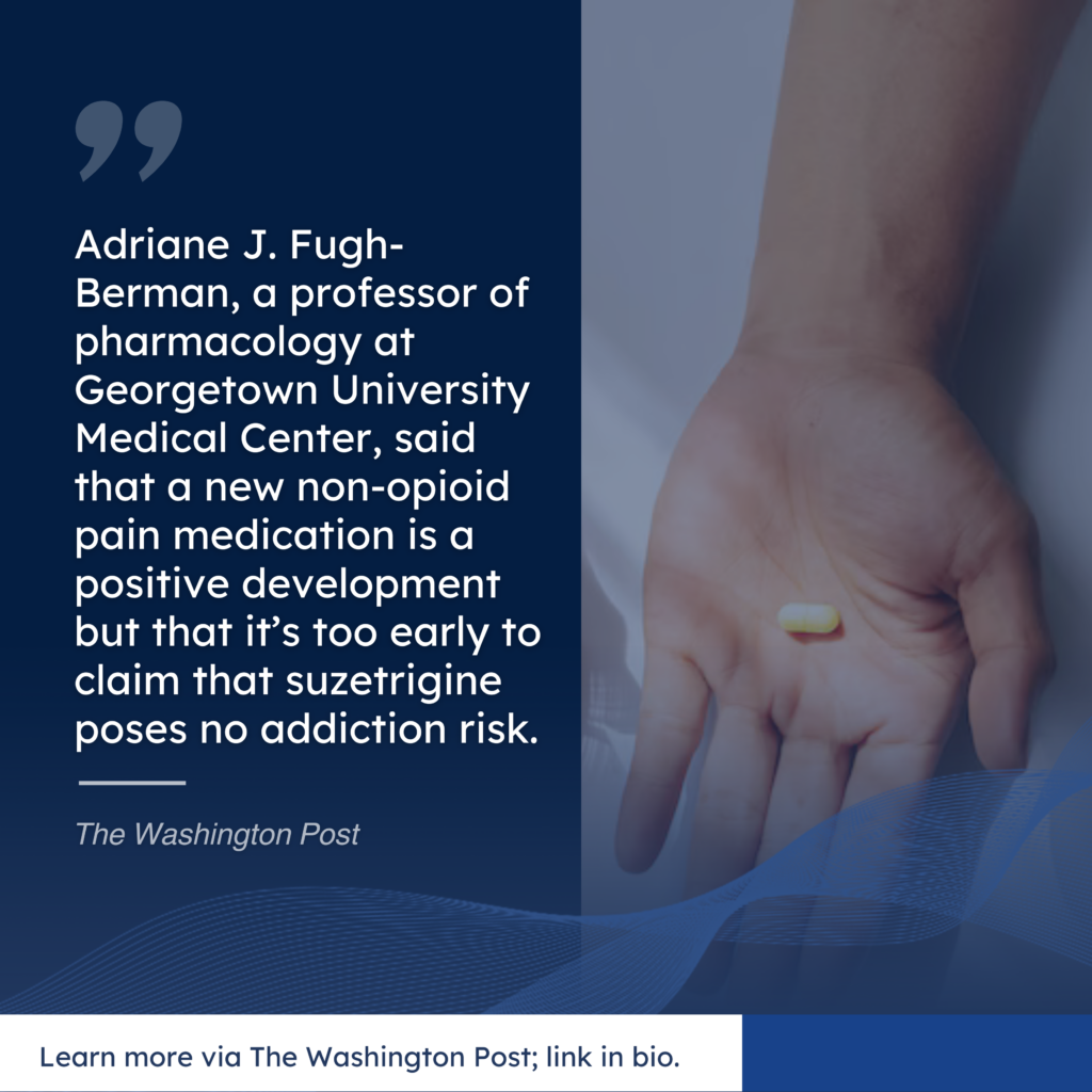 A hand holds one small, oblong pill. On the left, white text reads as follows: "Adriane J. Fugh-Berman, a professor of pharmacology at Georgetown University Medical Center, said that a new non-opioid pain medication is a positive development but that it’s too early to claim that suzetrigine poses no addiction risk."